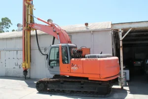 RH-50 HAWK Drill Unit mounted on HITACHI ZX 200 LC